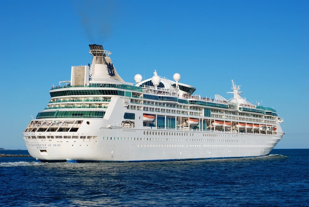 A cruise ship under way on open blue water
